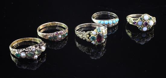 Five late 19th/early 20th century assorted gold and gem set dress rings, various sizes.